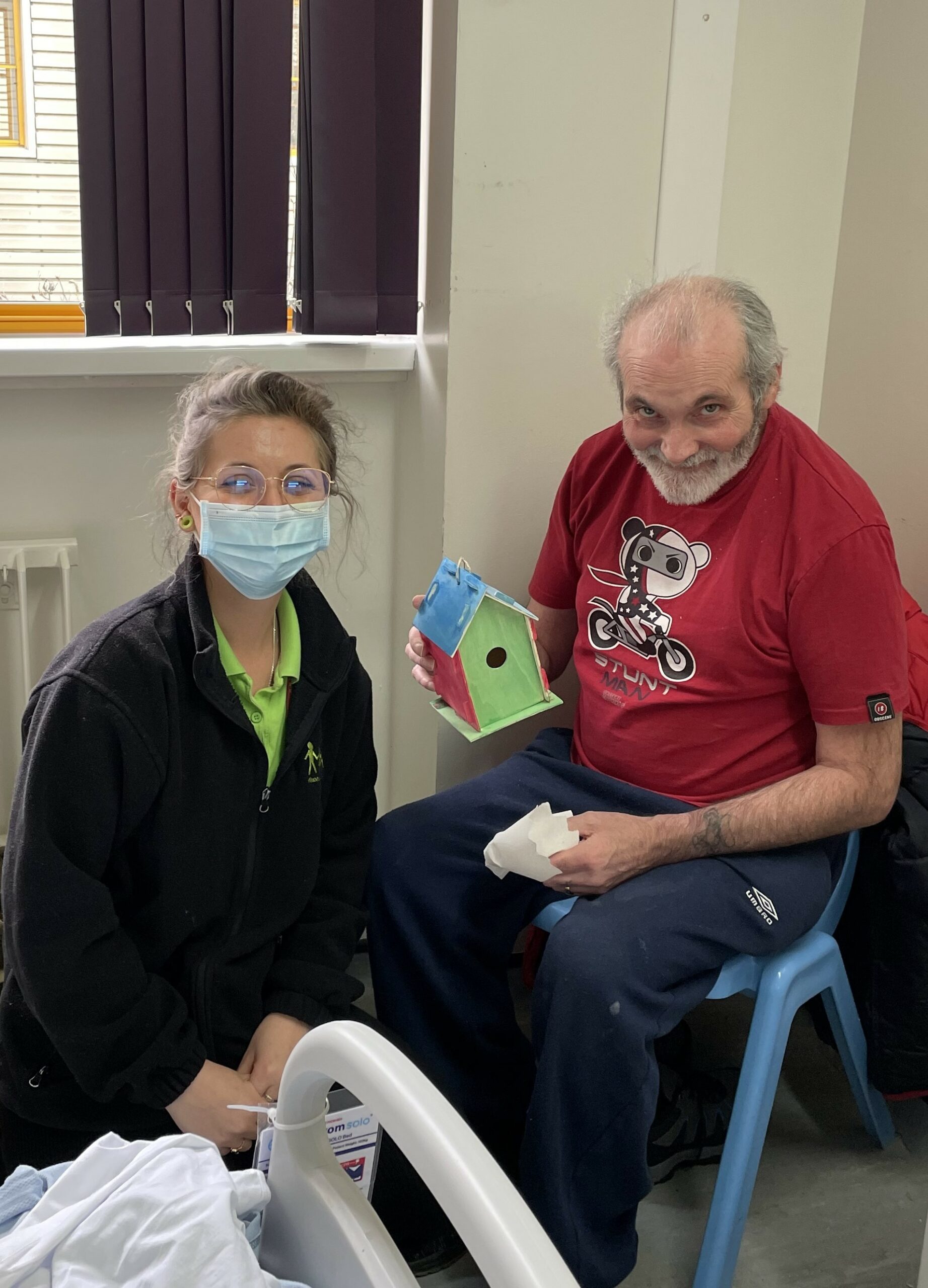 A patient shows off the results of his Meaningful Activities