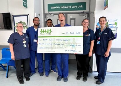 Dr Jamie Strachan presented the hospital charity with his donation of £1545