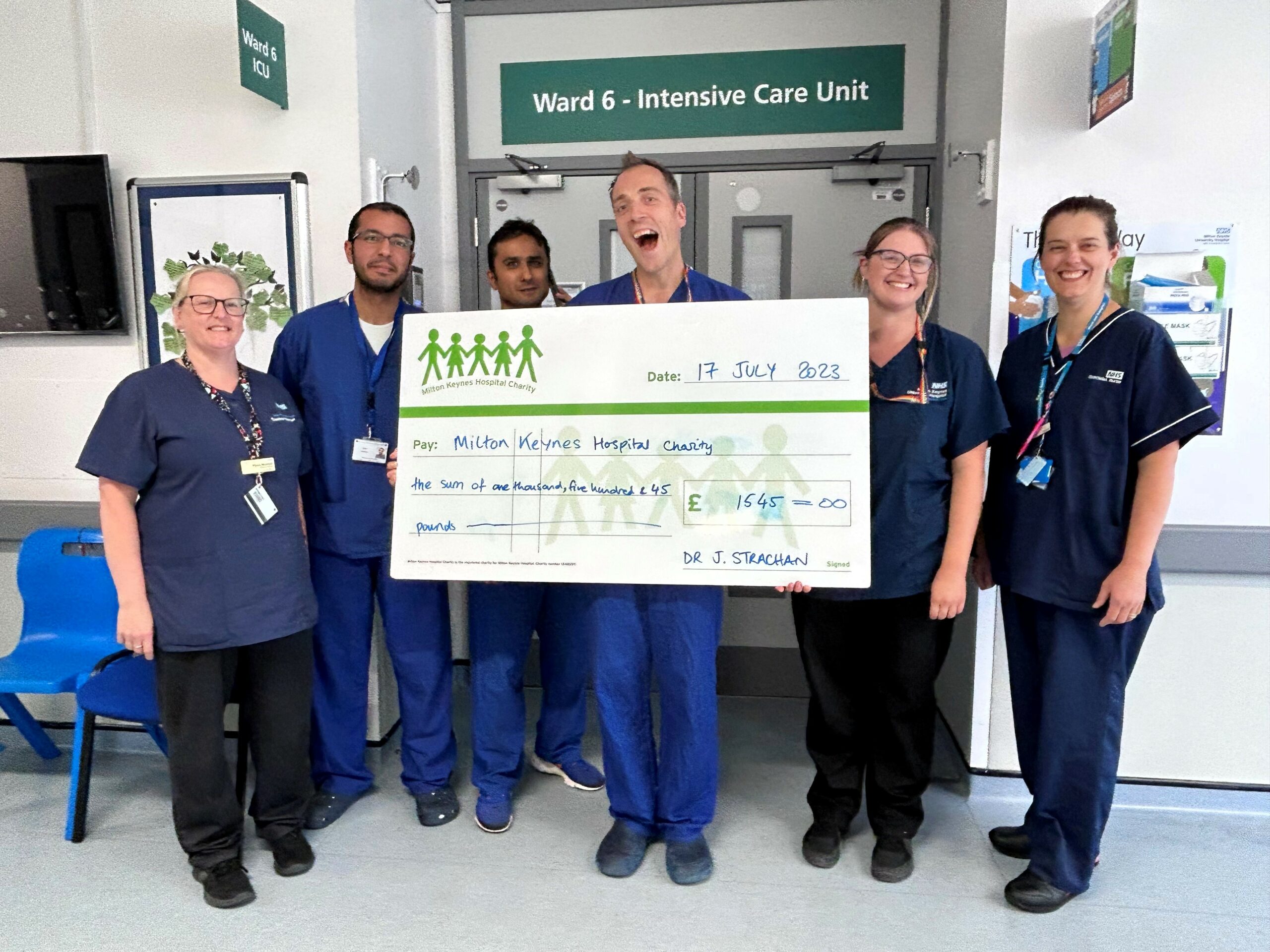 Dr Jamie Strachan presented the hospital charity with his donation of £1545